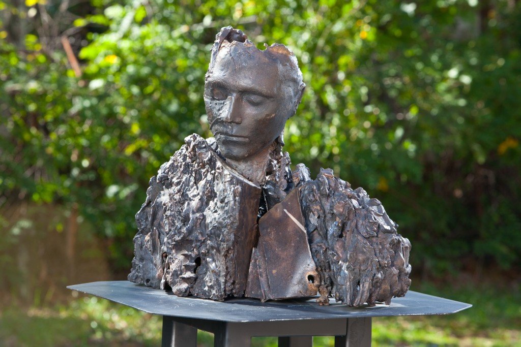 Cast Bronze sculpture of a man by molotov metalworks