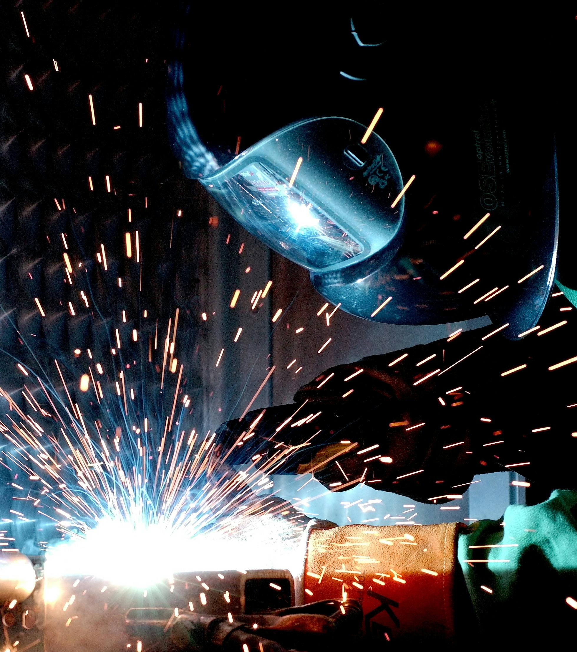 Welder with sparks flying